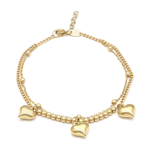 Pulsera de dos hilos eslabón combinado con aplicaciones y colgantes motivo corazón en oro amarillo 14 kilates.