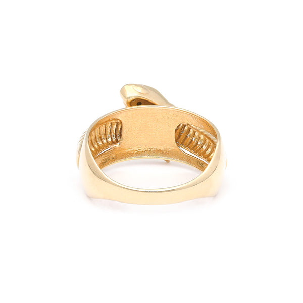 Anillo diseño especial motivo gusano con sintéticos en oro amarillo 14 kilates.