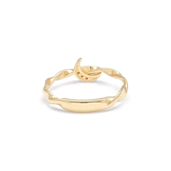 Anillo estilizado motivo luna con circonias en oro amarillo 14 kilates.