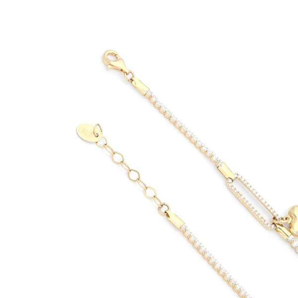 Pulsera eslabón articulado motivo corazón con circonias en oro amarillo 14 kilates.