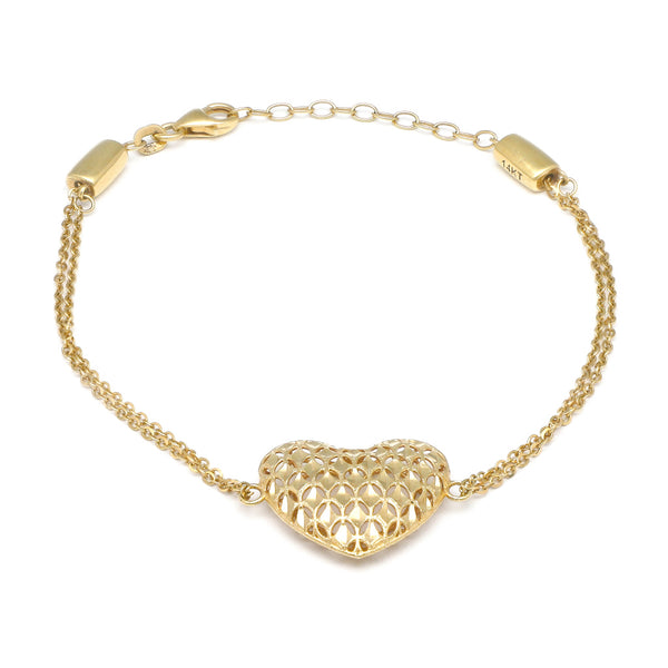 Pulsera de dos hilos eslabón cruzado con aplicación motivo corazón en oro amarillo 14 kilates.