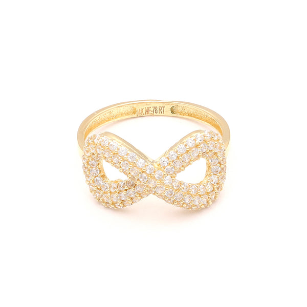 Anillo calado motivo infinito con circonias en oro amarillo 14 kilates.