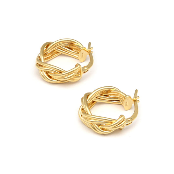 Arracadas trenzadas en oro amarillo 14 kilates.