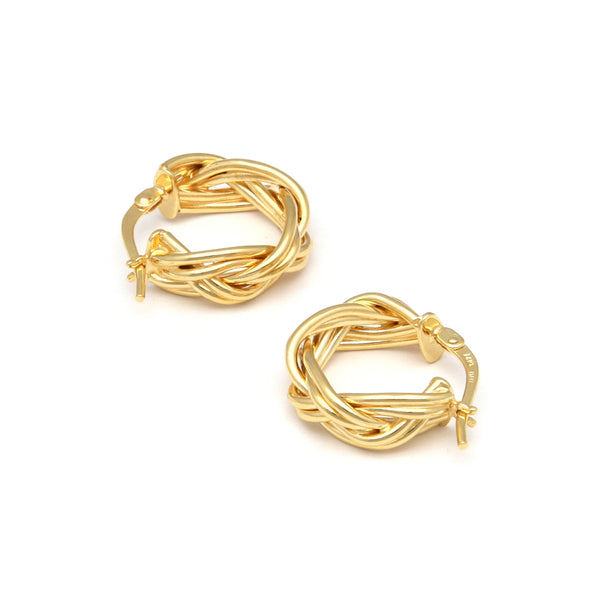 Arracadas trenzadas en oro amarillo 14 kilates.