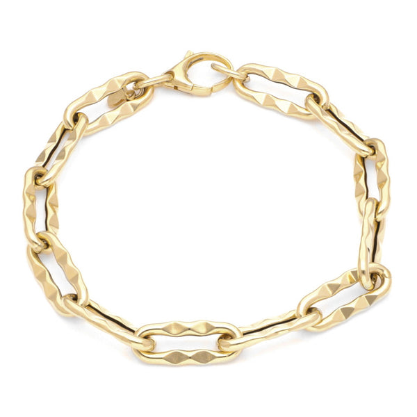 Pulsera eslabón cruzado facetado en oro amarillo 14 kilates.