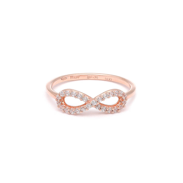 Anillo calado motivo infinito con circonias en oro rosa 14 kilates.