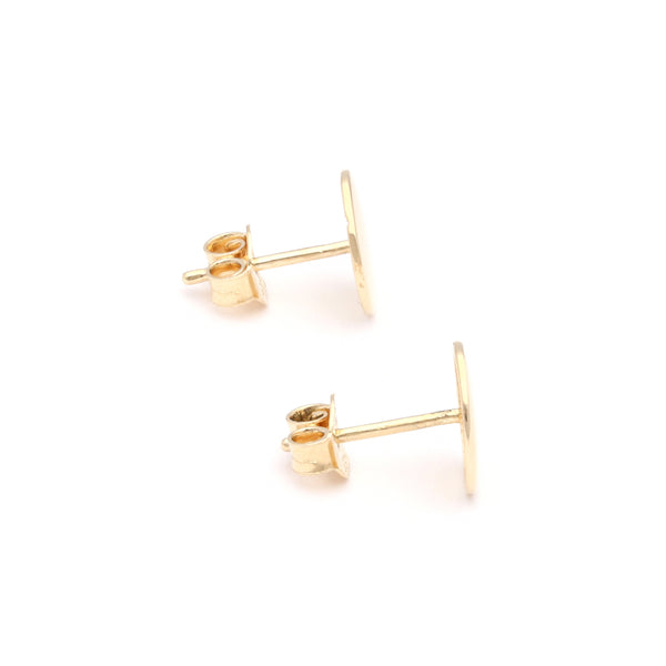 Aretes lisos motivo círculo en oro amarillo 14 kilates.