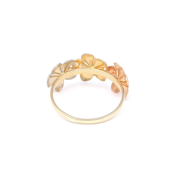 Anillo diseño especial motivo flores en oro tres tonos 14 kilates.