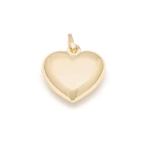 Dije hueco motivo corazón en oro amarillo 14 kilates.