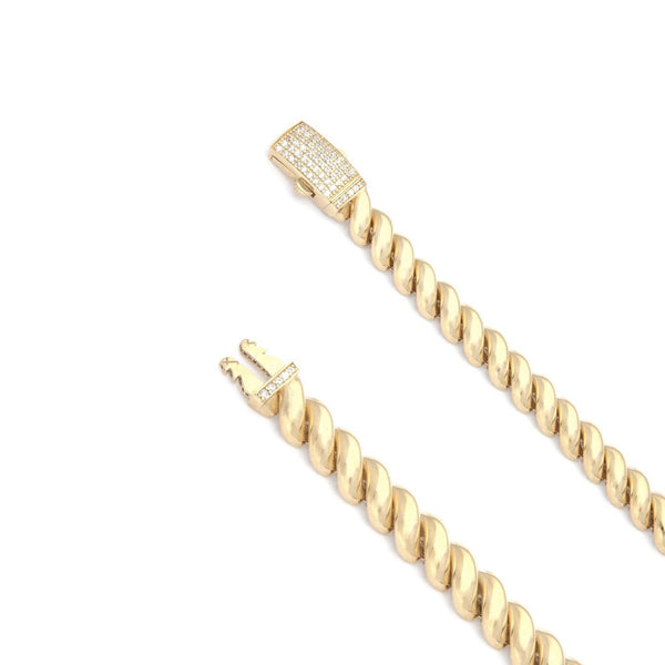Pulsera eslabón articulado con circonias en oro amarillo 14 kilates.