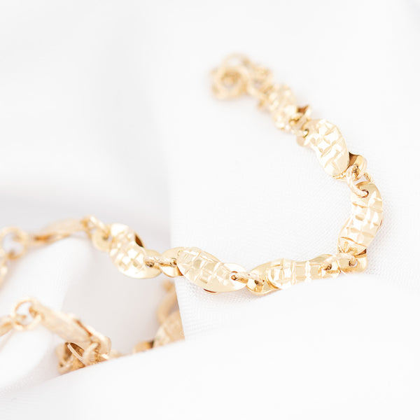 Pulsera eslabón articulado en oro amarillo 14 kilates.
