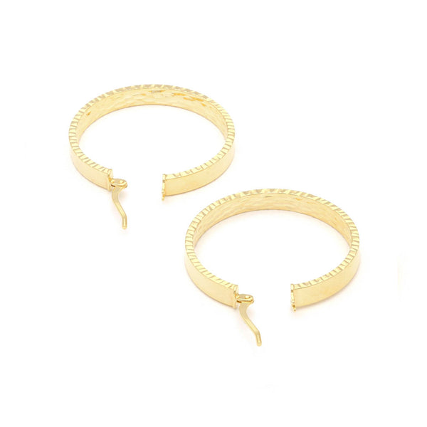 Arracadas diseño especial en oro amarillo 14 kilates.