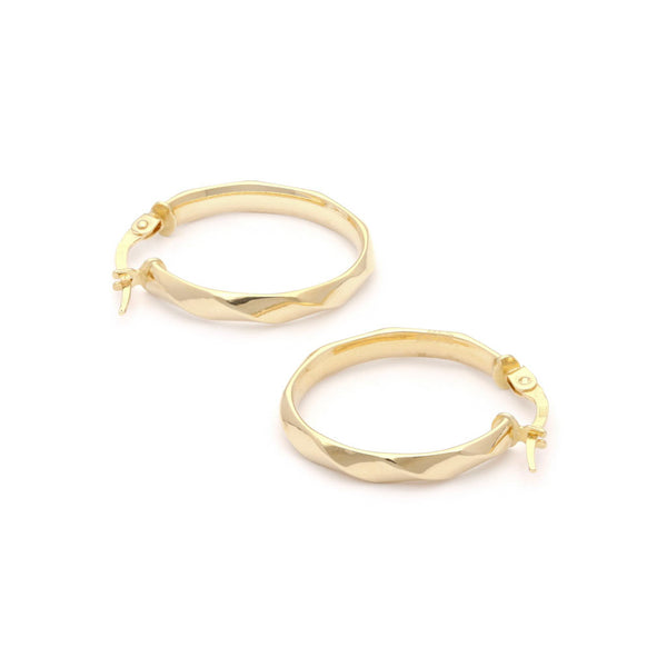 Arracadas facetadas en oro amarillo 14 kilates.