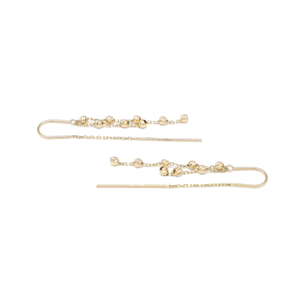 Aretes diseño especial con colgantes en oro amarillo 14 kilates.