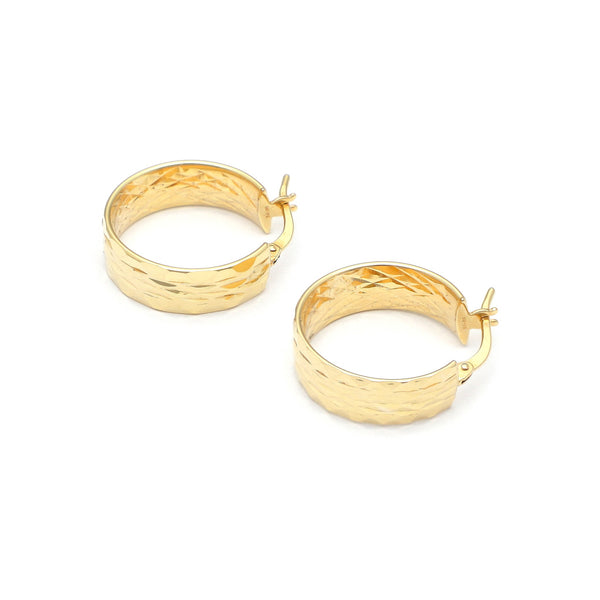 Arracadas facetadas en oro amarillo 14 kilates.