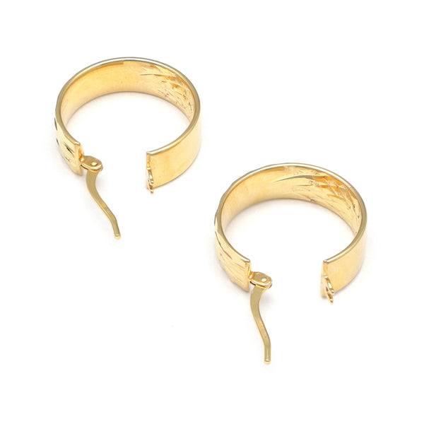 Arracadas facetadas en oro amarillo 14 kilates.