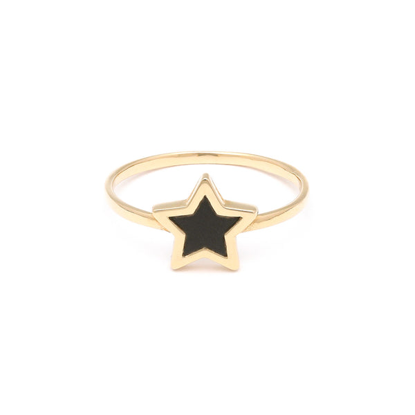 Anillo liso motivo estrella con sintético en oro amarillo 14 kilates.