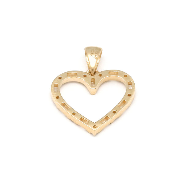Dije diseño especial motivo corazón con circonias en oro amarillo 14 kilates.