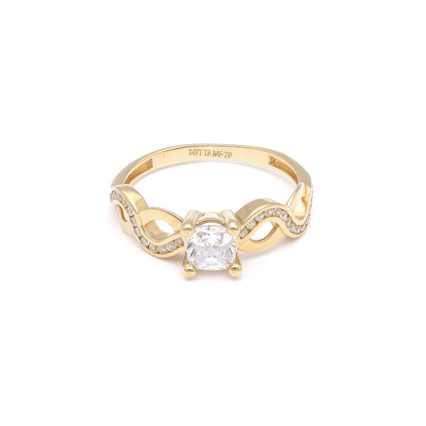 Anillo de compromiso con circonias en oro amarillo 14 kilates.