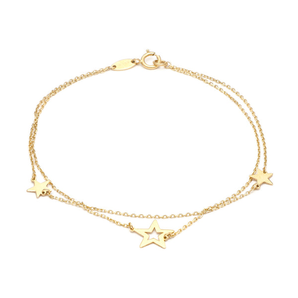 Pulsera de dos hilos eslabón cruzado con aplicaciones motivo estrellas en oro amarillo 14 kilates.