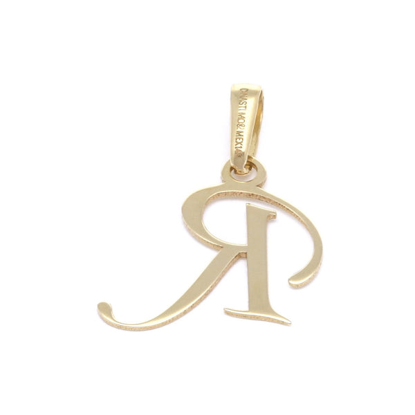 Dije liso motivo letra R en oro amarillo 14 kilates.