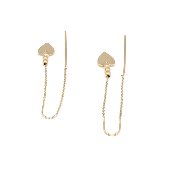 Aretes diseño especial con colgantes motivo corazón en oro amarillo 14 kilates.