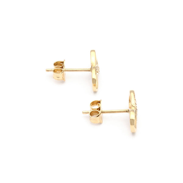 Aretes diseño especial con circonias motivo infinito en oro amarillo 14 kilates.