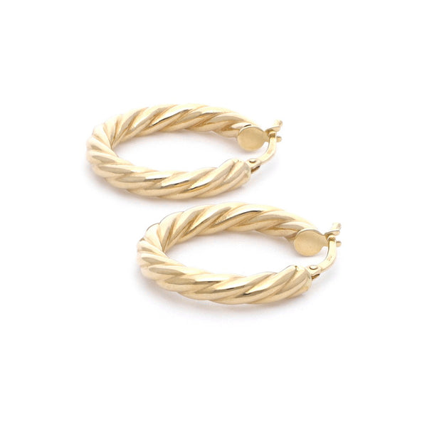 Arracadas torzal en oro amarillo 14 kilates.