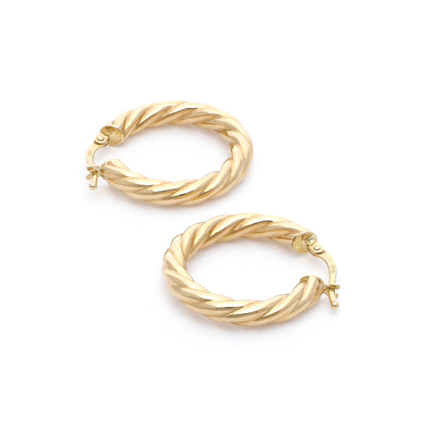 Arracadas torzal en oro amarillo 14 kilates.