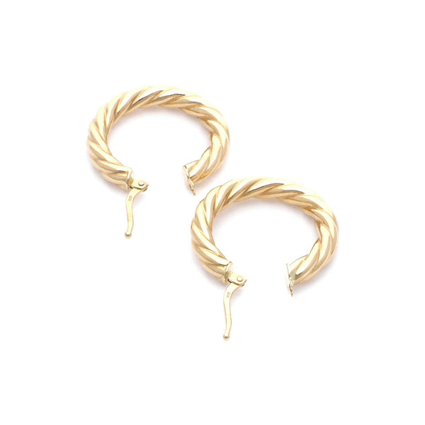 Arracadas torzal en oro amarillo 14 kilates.