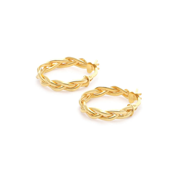 Arracadas trenzadas en oro amarillo 14 kilates.
