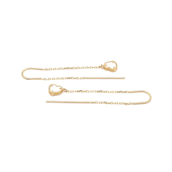Aretes diseño especial con colgantes motivo corazón y sintético en oro amarillo 14 kilates.