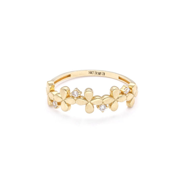 Anillo diseño especial con circonias motivo flores en oro amarillo 14 kilates.