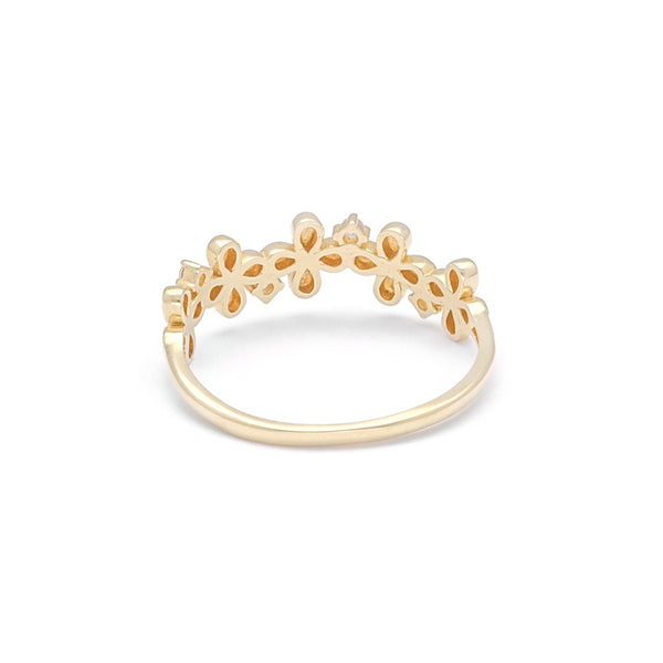 Anillo diseño especial con circonias motivo flores en oro amarillo 14 kilates.