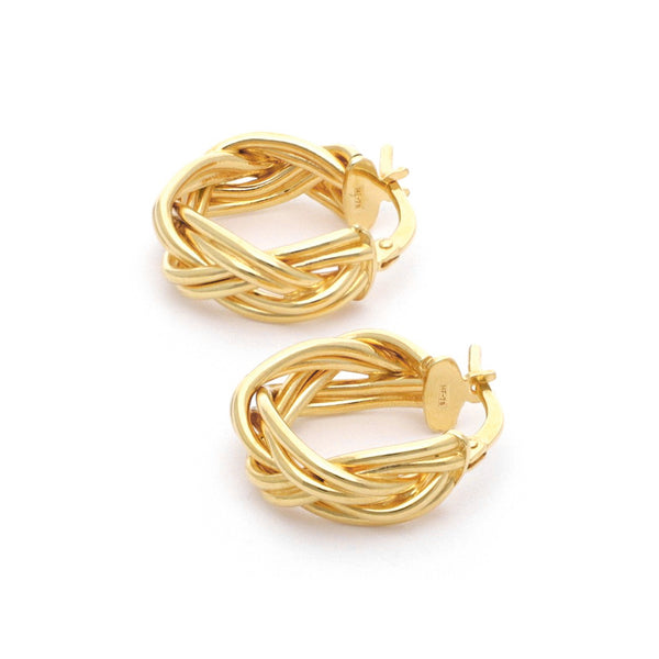 Arracadas trenzadas en oro amarillo 14 kilates.
