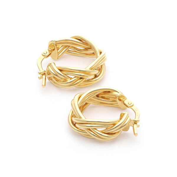Arracadas trenzadas en oro amarillo 14 kilates.