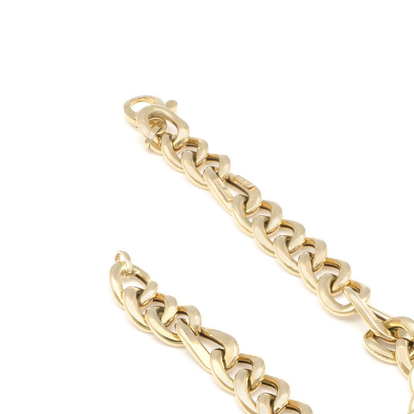 Pulsera eslabón barbado en oro amarillo 14 kilates.