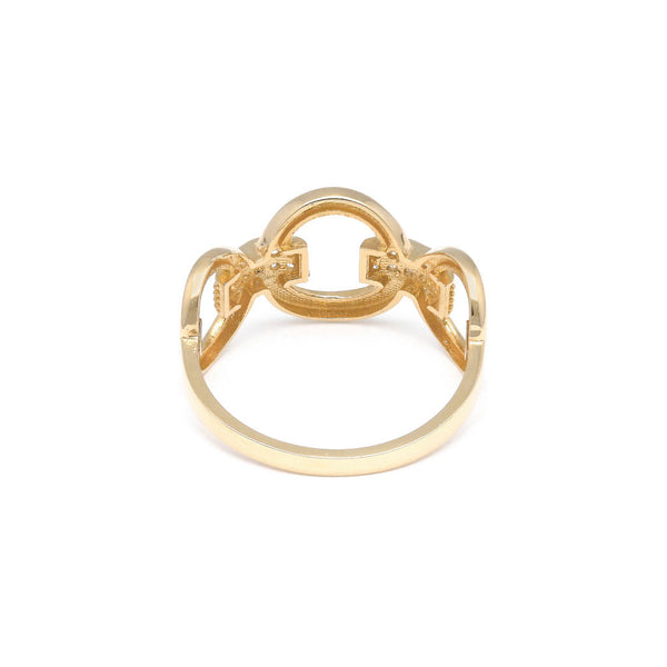 Anillo calado con circonias en oro amarillo 14 kilates.