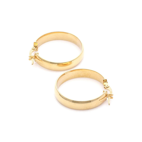 Arracadas lisas en oro amarillo 14 kilates.