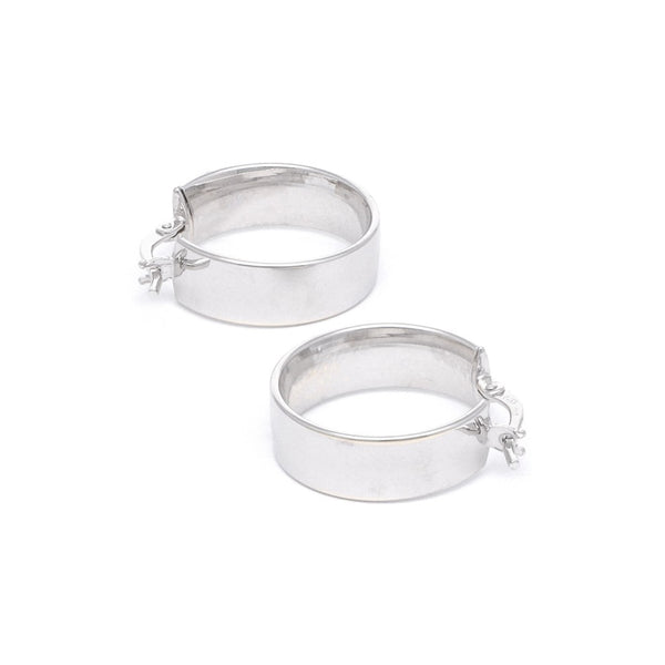 Arracadas facetadas en oro blanco 14 kilates.