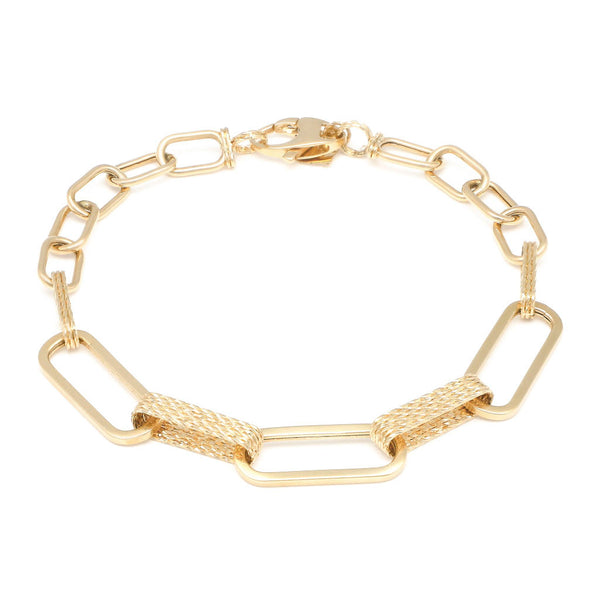 Pulsera eslabón cruzado en oro amarillo 14 kilates.