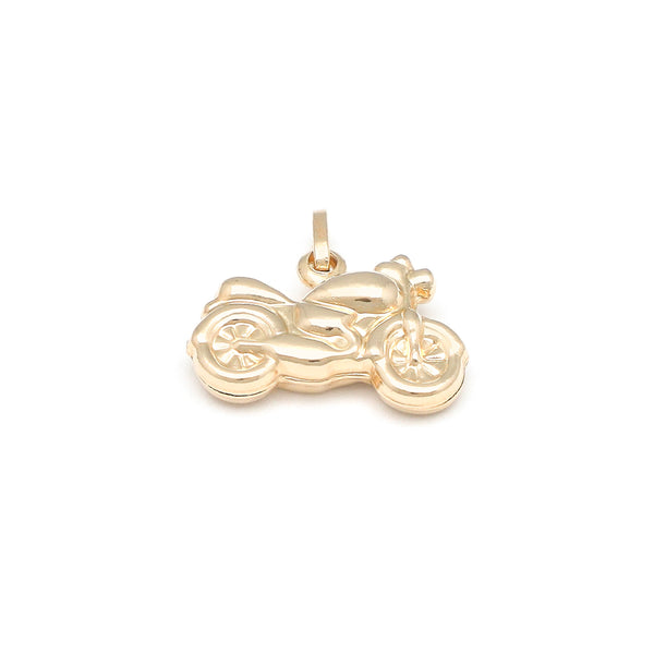 Dije diseño especial motivo motocicleta en oro amarillo 14 kilates.