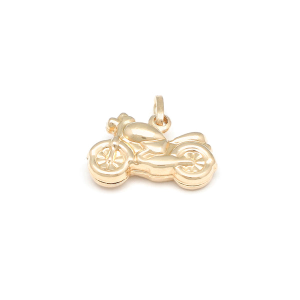Dije diseño especial motivo motocicleta en oro amarillo 14 kilates.