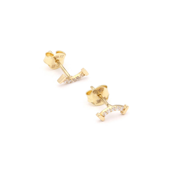 Aretes diseño especial con circonias en oro amarillo 14 kilates.