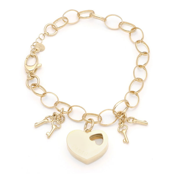 Pulsera eslabón cruzado con colgantes motivo corazón y llaves en oro amarillo 14 kilates.