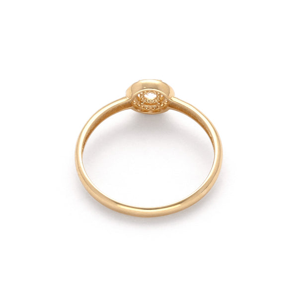 Anillo diseño especial con circonias en oro amarillo 14 kilates.