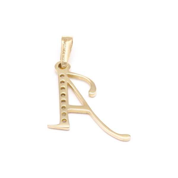 Dije liso con circonias motivo letra A oro amarillo 14 kilates.