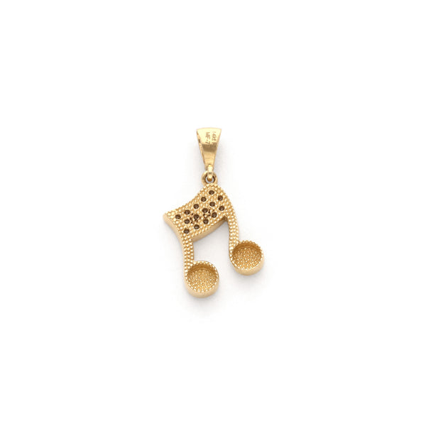 Dije diseño especial motivo nota musical con circonias en oro amarillo 14 kilates.