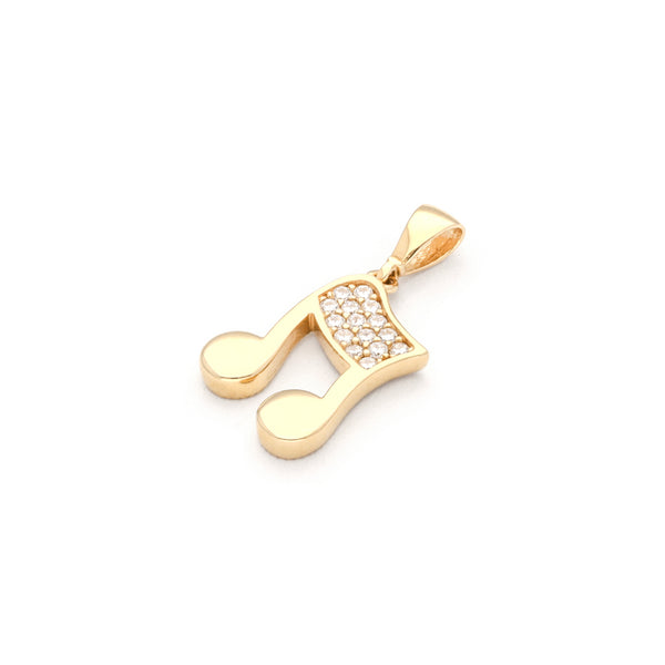 Dije diseño especial motivo nota musical con circonias en oro amarillo 14 kilates.