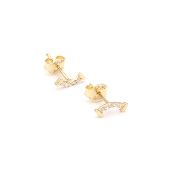 Aretes diseño especial con cirnonias en oro amarillo 14 kilates.